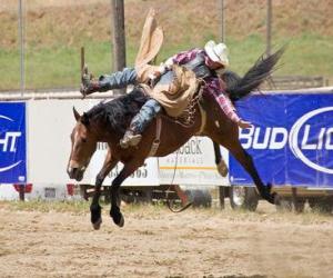 yapboz Kovboy bir rodeo bir yetiştirme binicilik